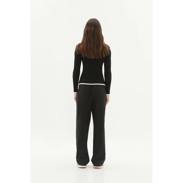Aje clothing Aus Tops – structured silhouette with raw femininity from Coveti