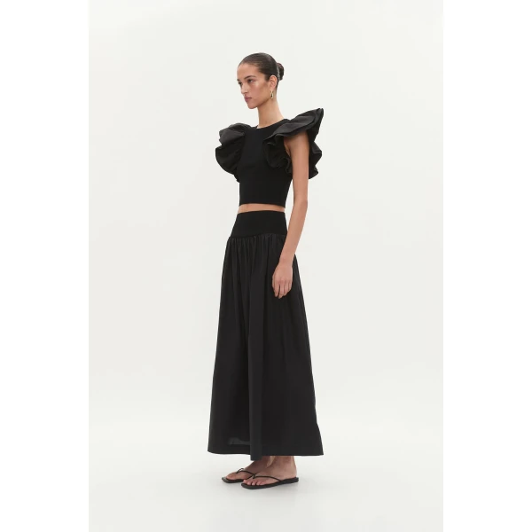 Aje Aus Tops – structured silhouette with raw femininity from Coveti