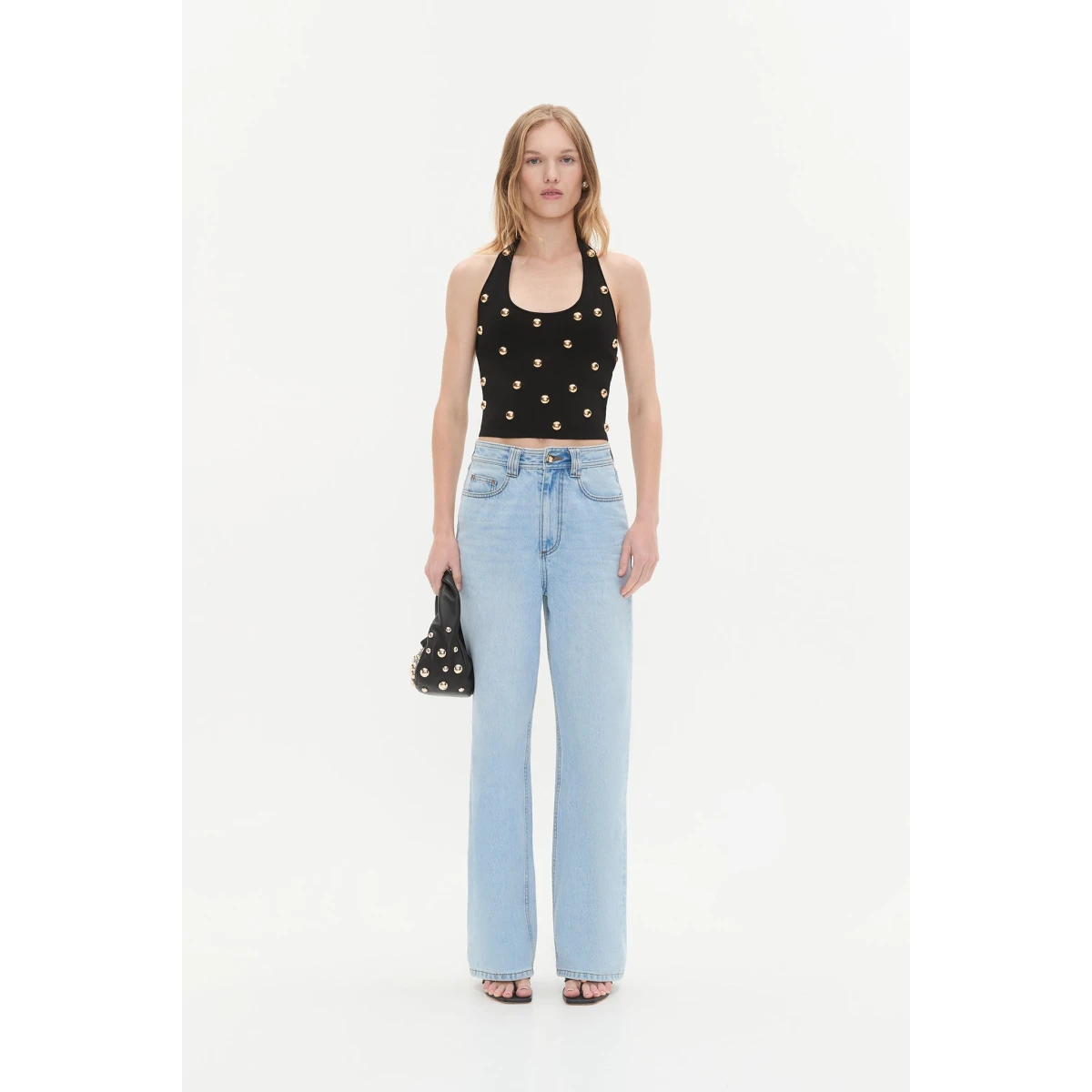 Aje clothing Aus Tops – structured silhouette with raw femininity from Coveti