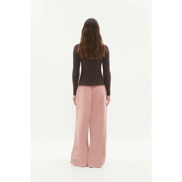 Aje clothing Aus Tops – structured silhouette with raw femininity from Coveti