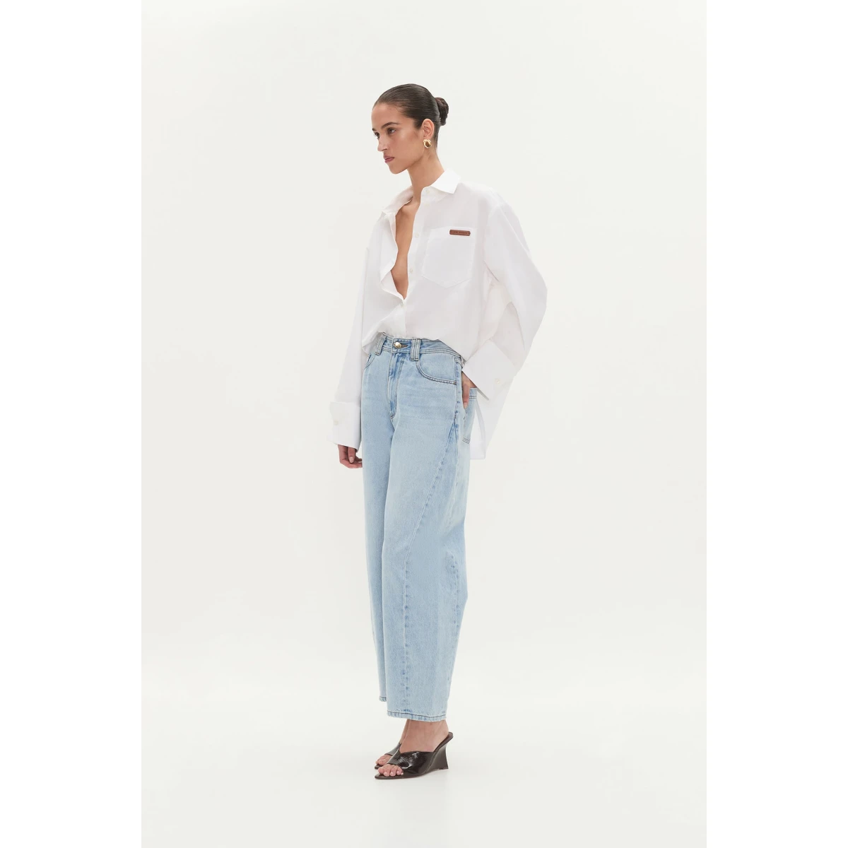 Aje Aus Tops – structured silhouette with raw femininity from Coveti