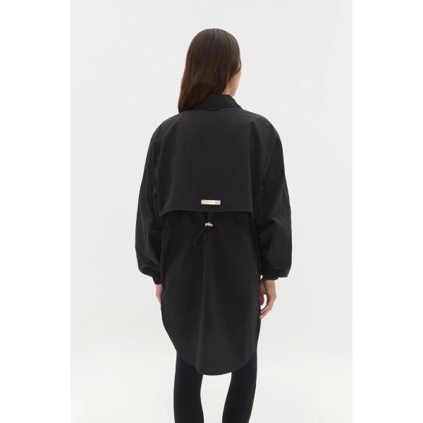 Aje Aus Tops – structured silhouette with raw femininity from Coveti