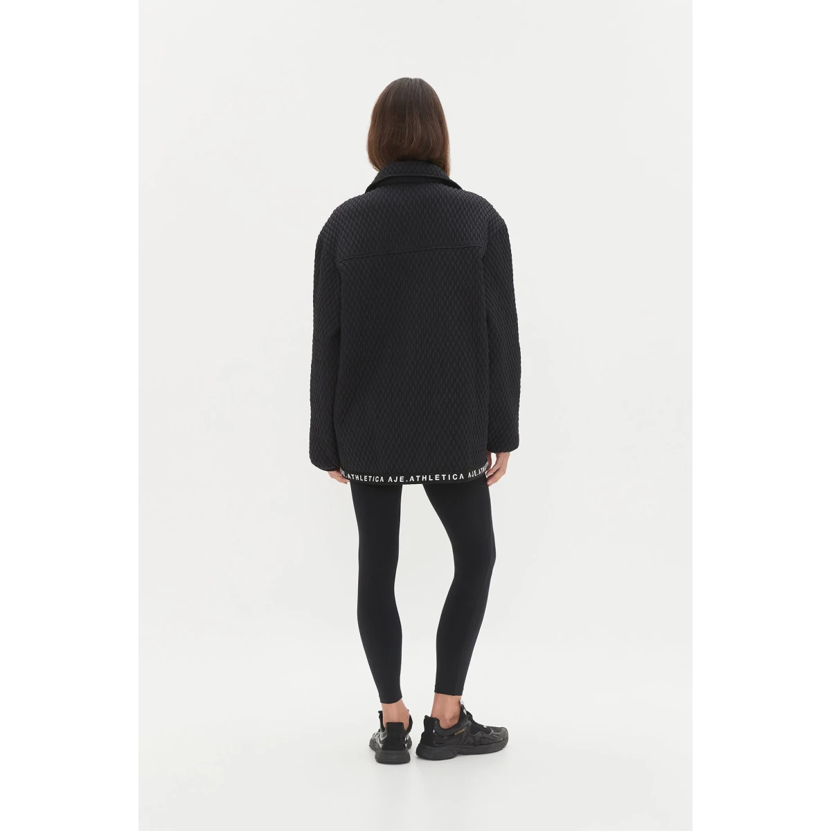 Aje clothing Aus Tops – structured silhouette with raw femininity from Coveti