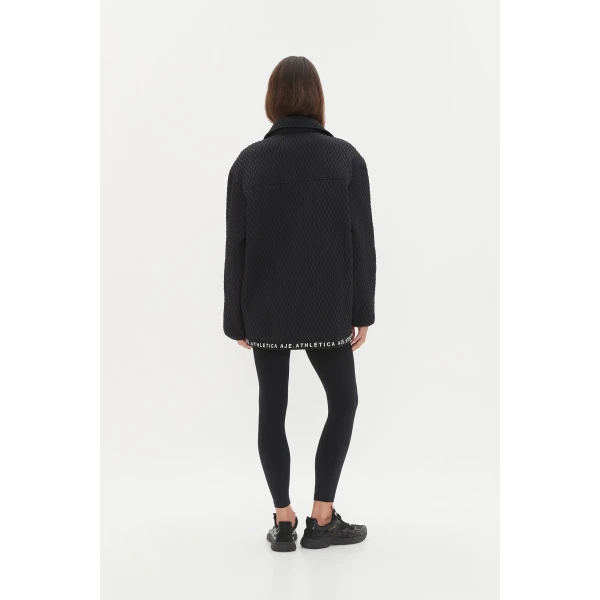 Aje clothing Aus Tops – structured silhouette with raw femininity from Coveti