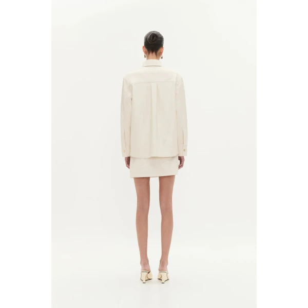 Aje clothing Aus Tops – structured silhouette with raw femininity from Coveti