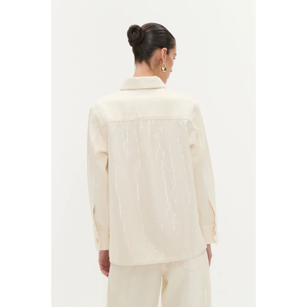 Aje Aus Tops – structured silhouette with raw femininity from Coveti