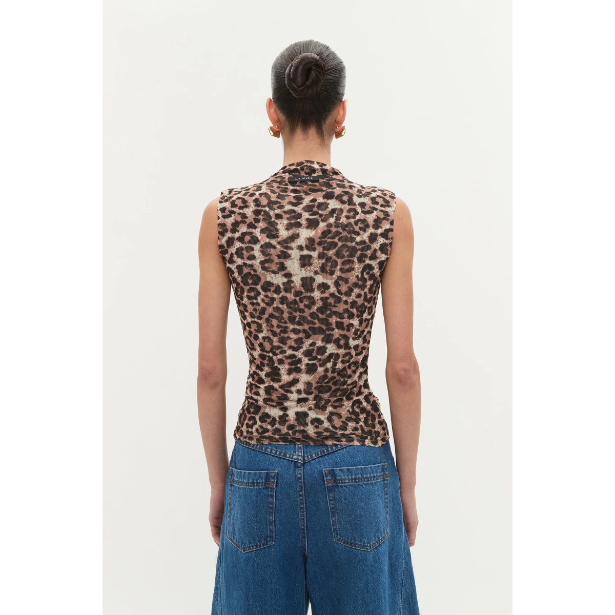 Aje Aus Tops – structured silhouette with raw femininity from Coveti