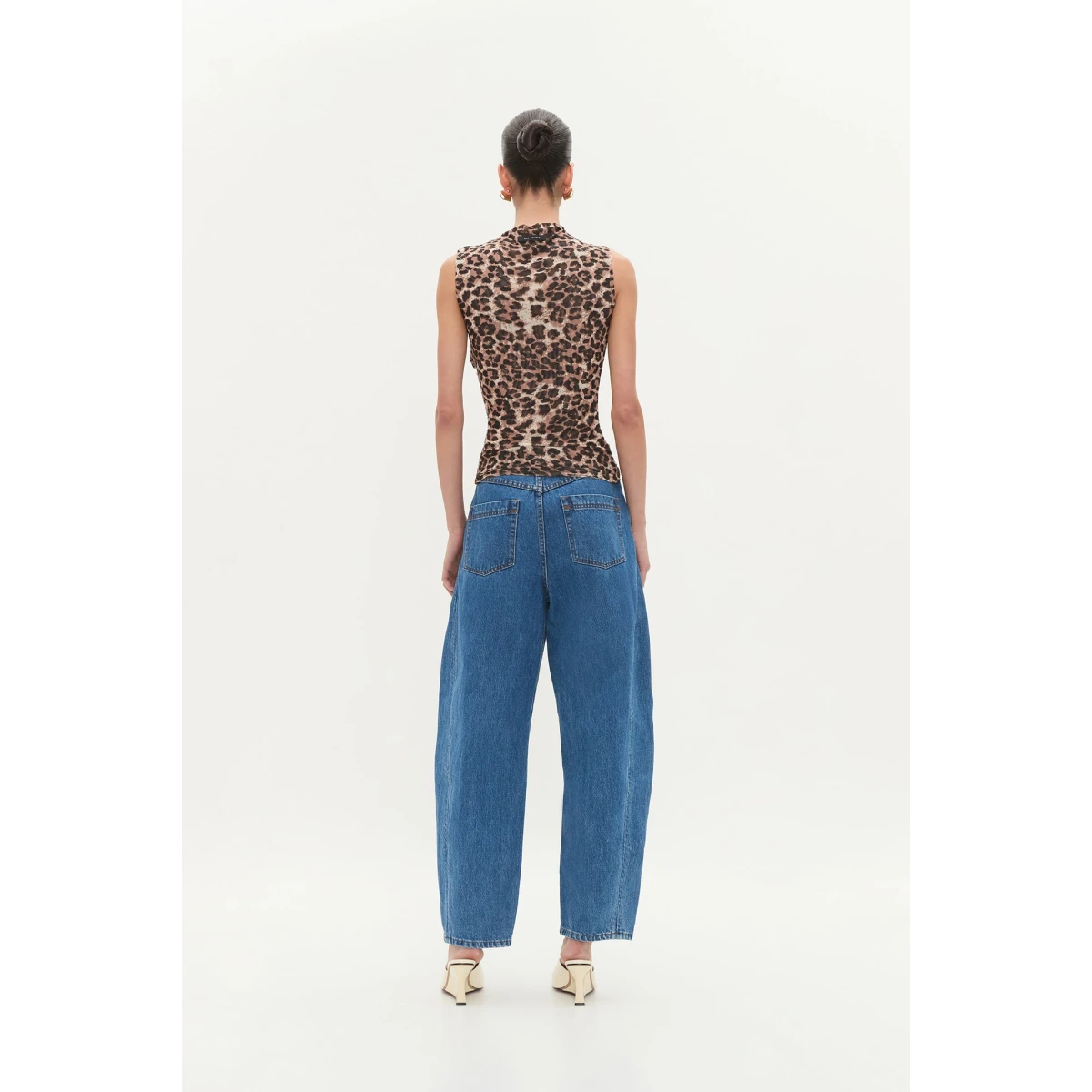Aje clothing Aus Tops – structured silhouette with raw femininity from Coveti