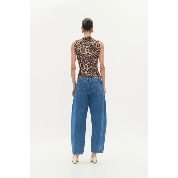 Aje clothing Aus Tops – structured silhouette with raw femininity from Coveti