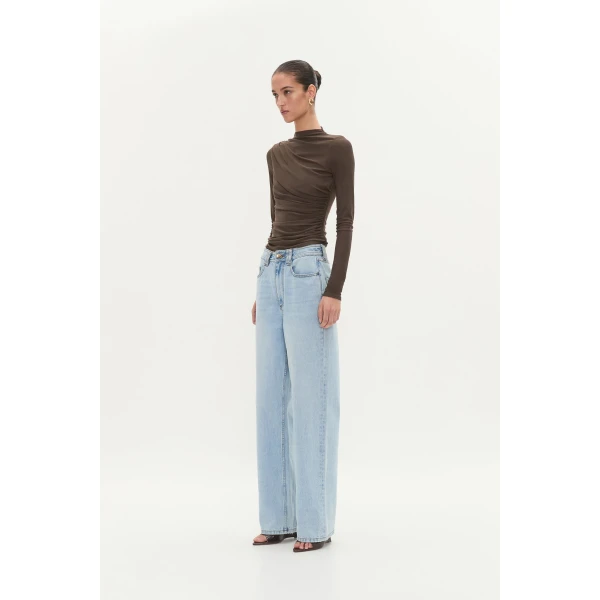 Aje Aus Tops – structured silhouette with raw femininity from Coveti