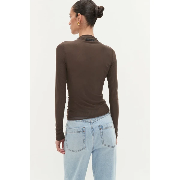 Aje clothing Aus Tops – structured silhouette with raw femininity from Coveti
