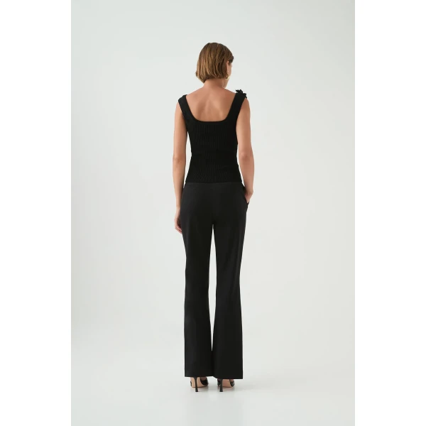 Aje clothing Aus Tops – structured silhouette with raw femininity from Coveti