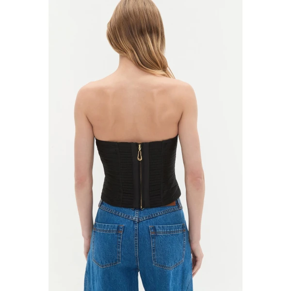 Aje clothing Aus Tops – structured silhouette with raw femininity from Coveti