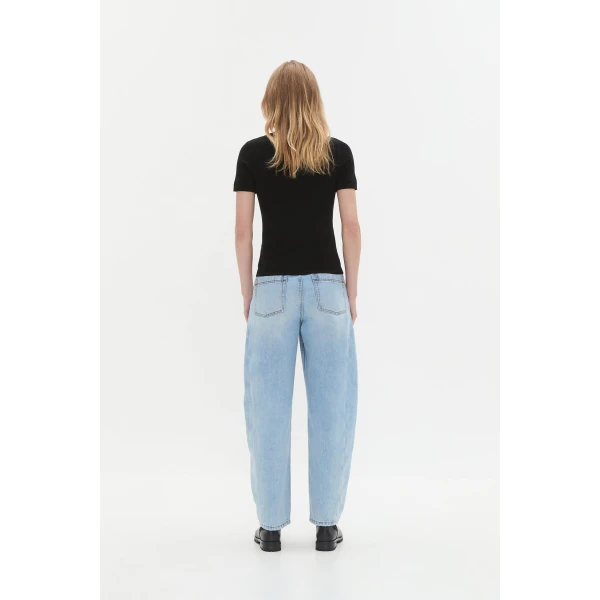 Aje clothing Aus Tops – structured silhouette with raw femininity from Coveti