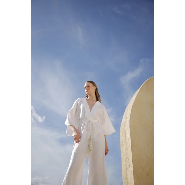Andres Otalora luxury designer Jumpsuit with bold silhouette in linen