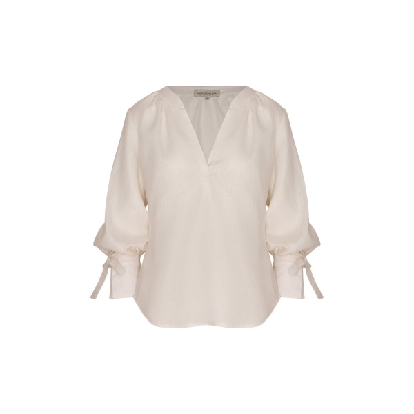 Andres Otalora luxury designer Top with bold silhouette in linen