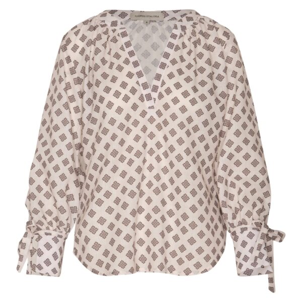 Andres Otalora luxury designer Top with bold silhouette in linen