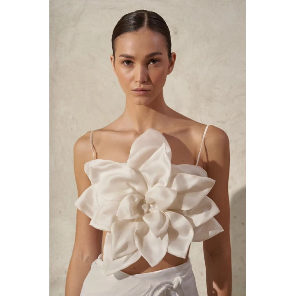 Andres Otalora luxury designer Top with bold silhouette in linen