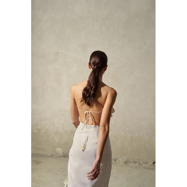 Andres Otalora luxury designer Top with bold silhouette in linen