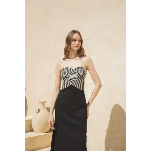 Andres Otalora luxury designer Dress with bold silhouette in linen