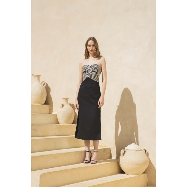 Andres Otalora luxury designer Dress with bold silhouette in linen
