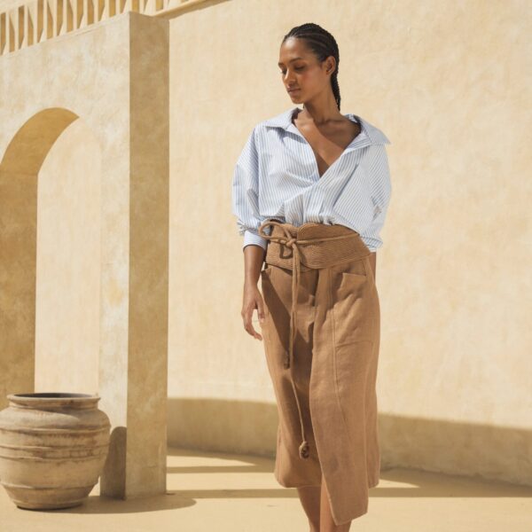 Andres Otalora luxury designer Top with bold silhouette in linen