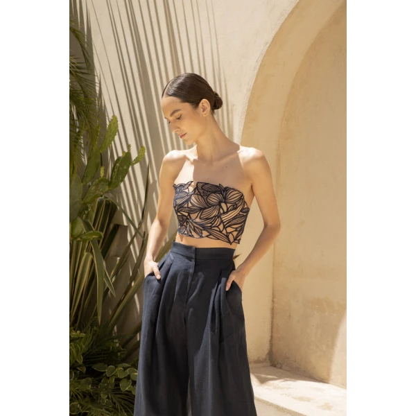 Andres Otalora luxury designer Top with bold silhouette in linen