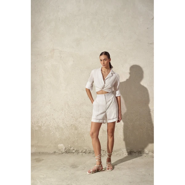 Andres Otalora luxury designer Top with bold silhouette in linen