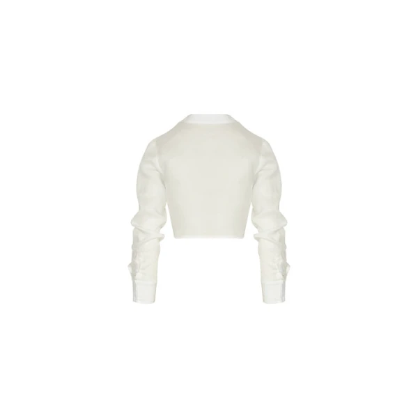 Andres Otalora luxury designer Top with bold silhouette in linen