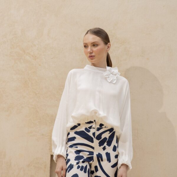 Andres Otalora luxury designer Top with bold silhouette in linen
