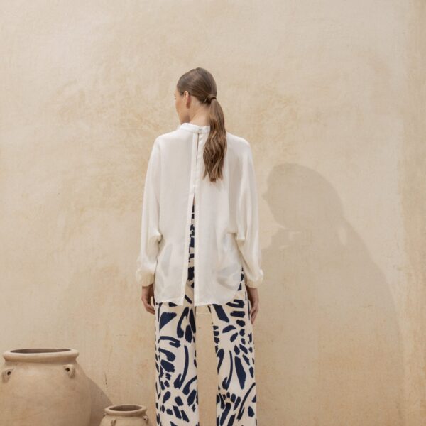Andres Otalora luxury designer Top with bold silhouette in linen