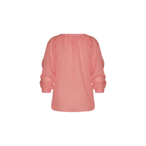 Andres Otalora luxury designer Top with bold silhouette in linen
