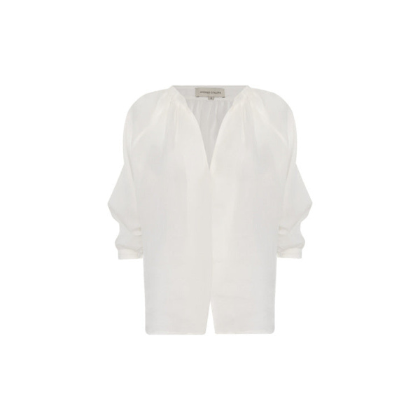 Andres Otalora luxury designer Top with bold silhouette in linen