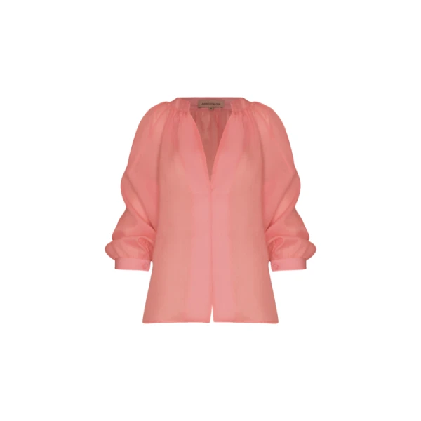 Andres Otalora luxury designer Top with bold silhouette in linen