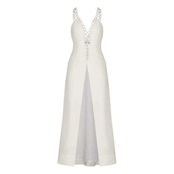 Andres Otalora luxury designer Top with bold silhouette in linen