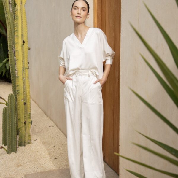 Andres Otalora luxury designer Top with bold silhouette in linen
