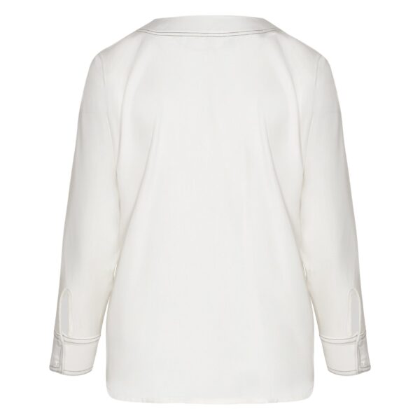Andres Otalora luxury designer Top with bold silhouette in linen