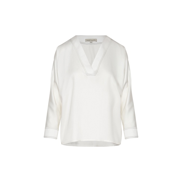 Andres Otalora luxury designer Top with bold silhouette in linen