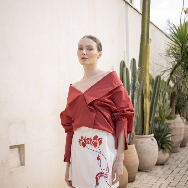 Andres Otalora luxury designer Top with bold silhouette in linen
