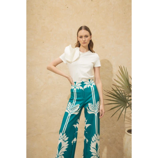 Andres Otalora luxury designer Top with bold silhouette in linen