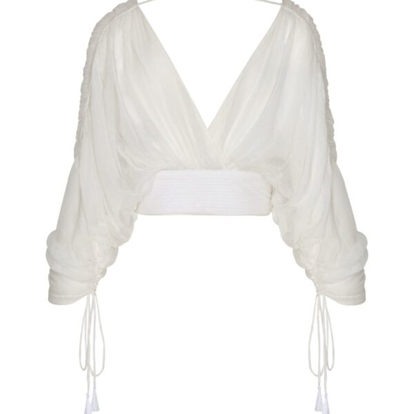 Andres Otalora luxury designer Top with bold silhouette in linen