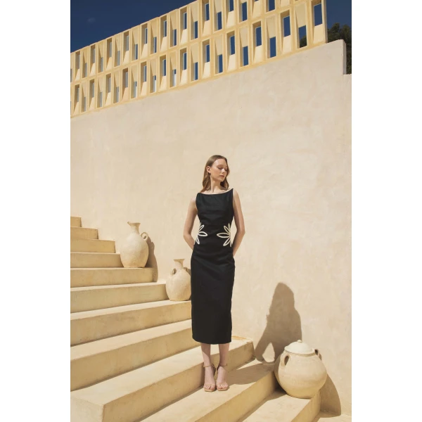 Andres Otalora luxury designer Dress with bold silhouette in linen