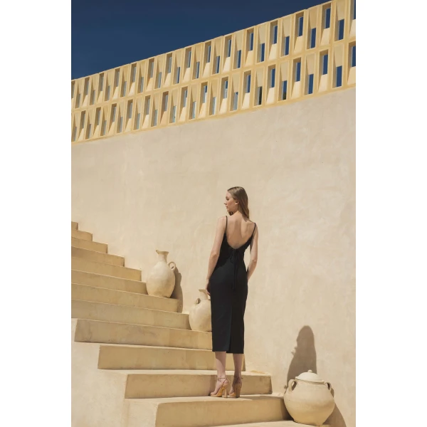 Andres Otalora luxury designer Dress with bold silhouette in linen
