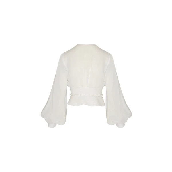 Andres Otalora luxury designer Top with bold silhouette in linen