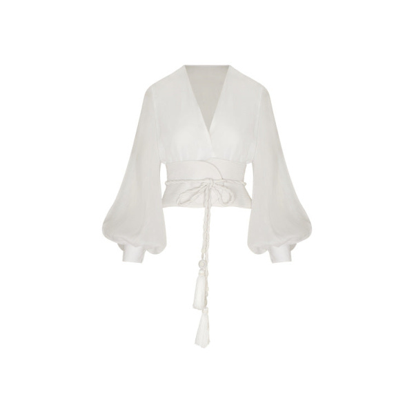 Andres Otalora luxury designer Top with bold silhouette in linen