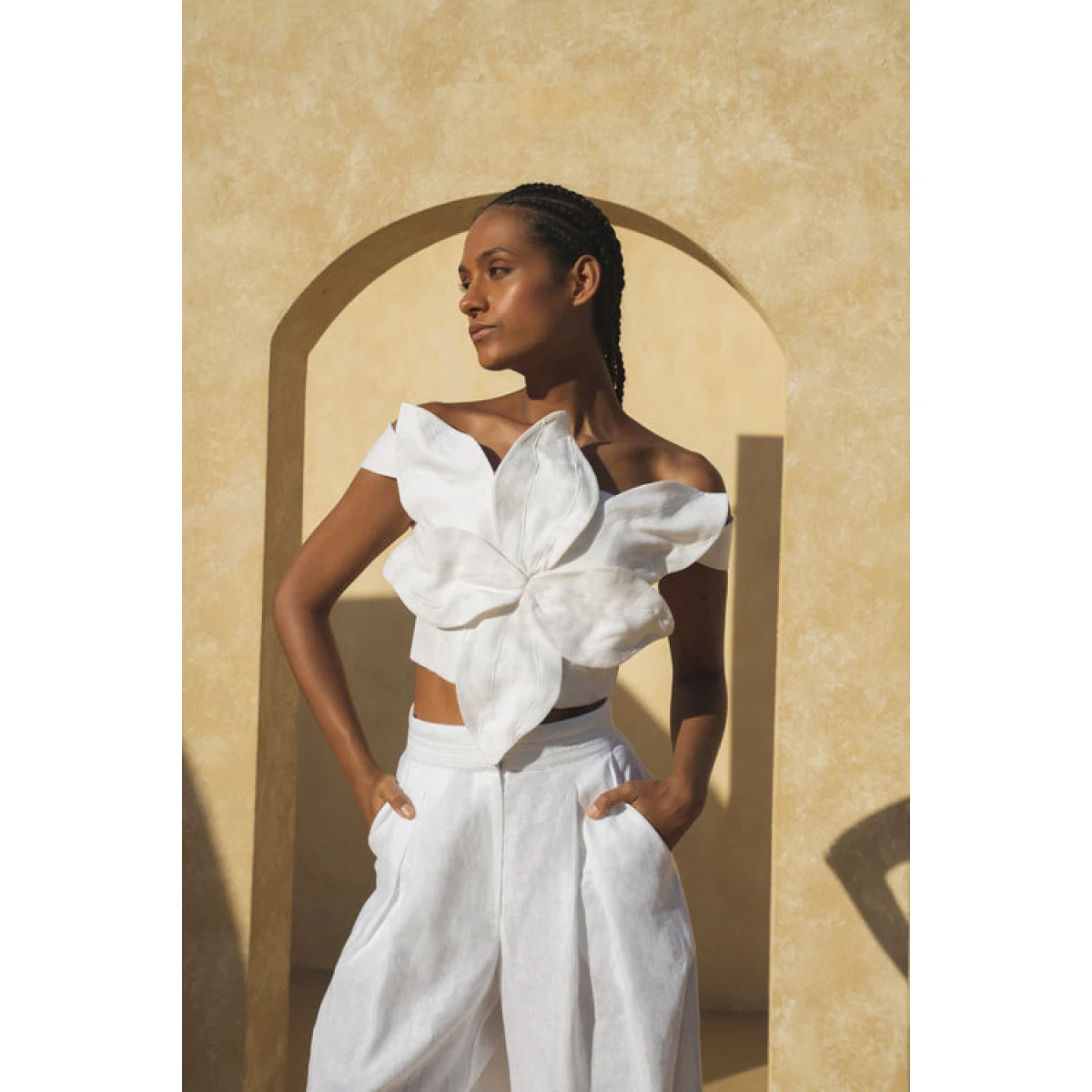 Andres Otalora luxury designer Top with bold silhouette in linen