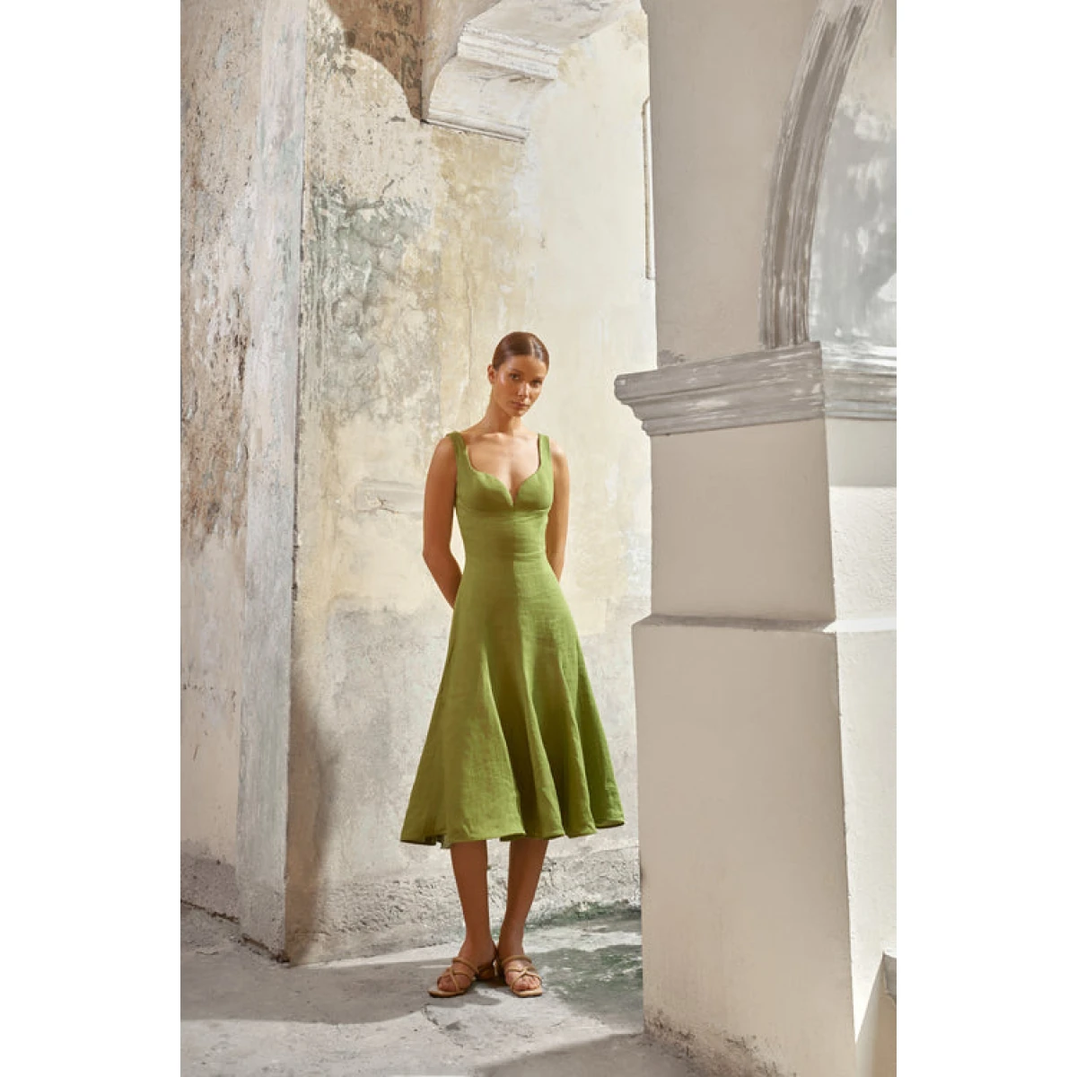 Andres Otalora luxury designer Dress with bold silhouette in linen
