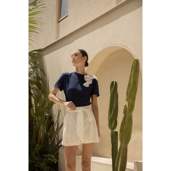 Andres Otalora luxury designer Top with bold silhouette in linen