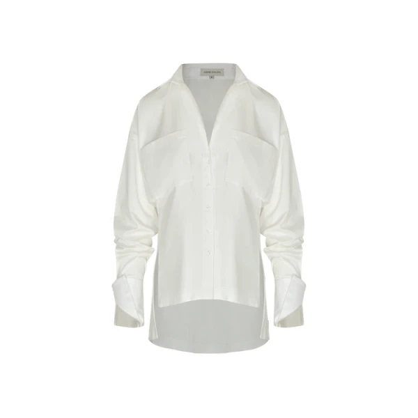 Andres Otalora luxury designer Top with bold silhouette in linen