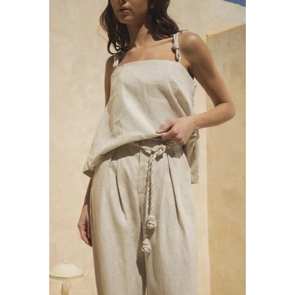 Andres Otalora luxury designer Top with bold silhouette in linen